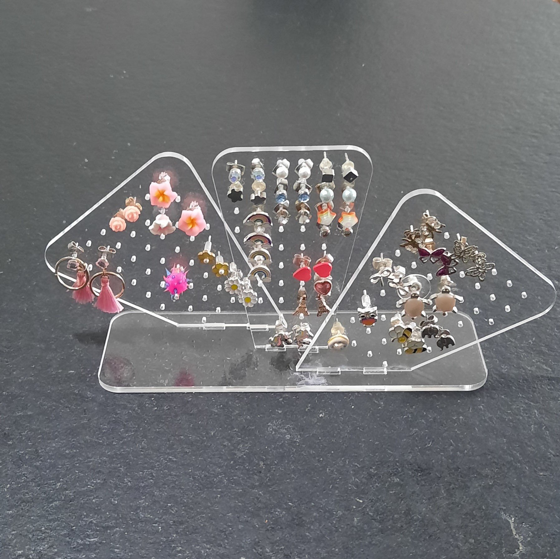 cover image of th tinker Compact ear stud rack
