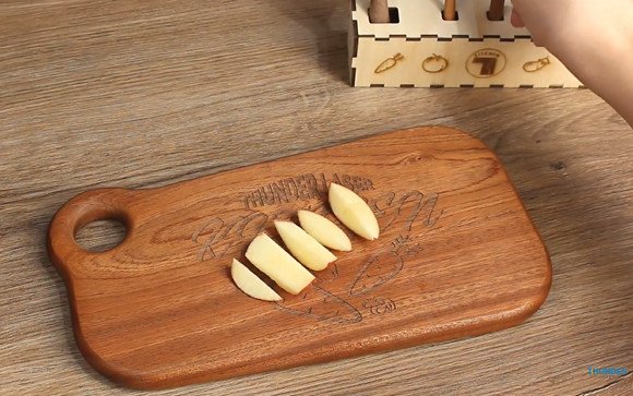 cover image of th tinker Cutting Board