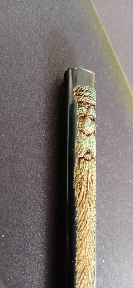 cover image of th tinker Santa Engraving In Carpenter Pencil