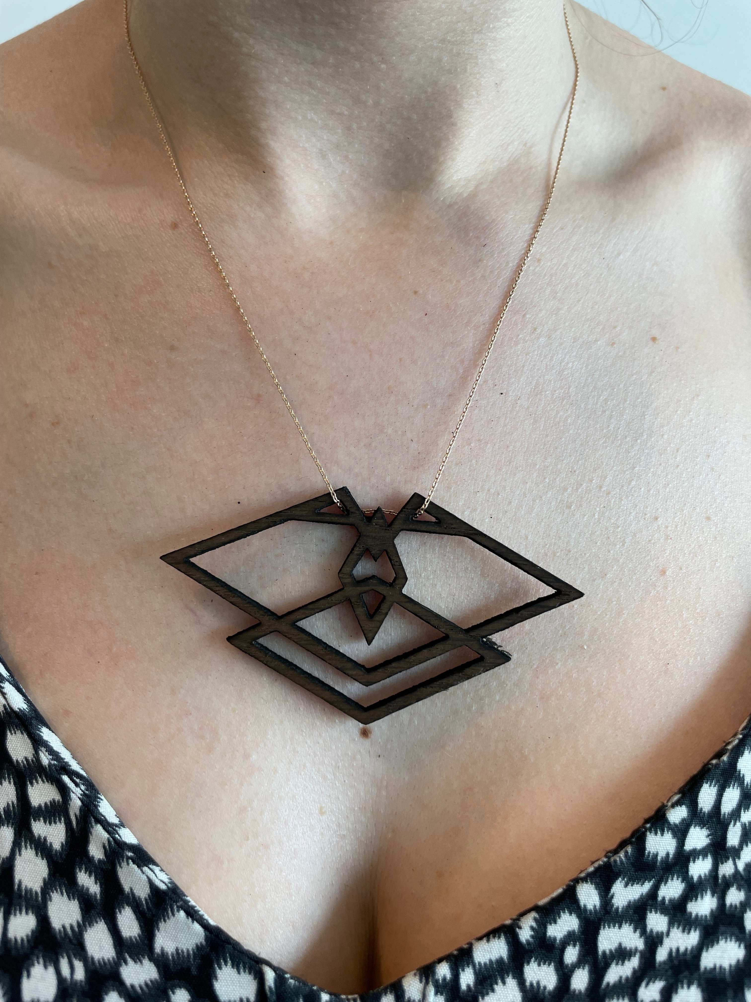 cover image of th tinker Geometric Necklace