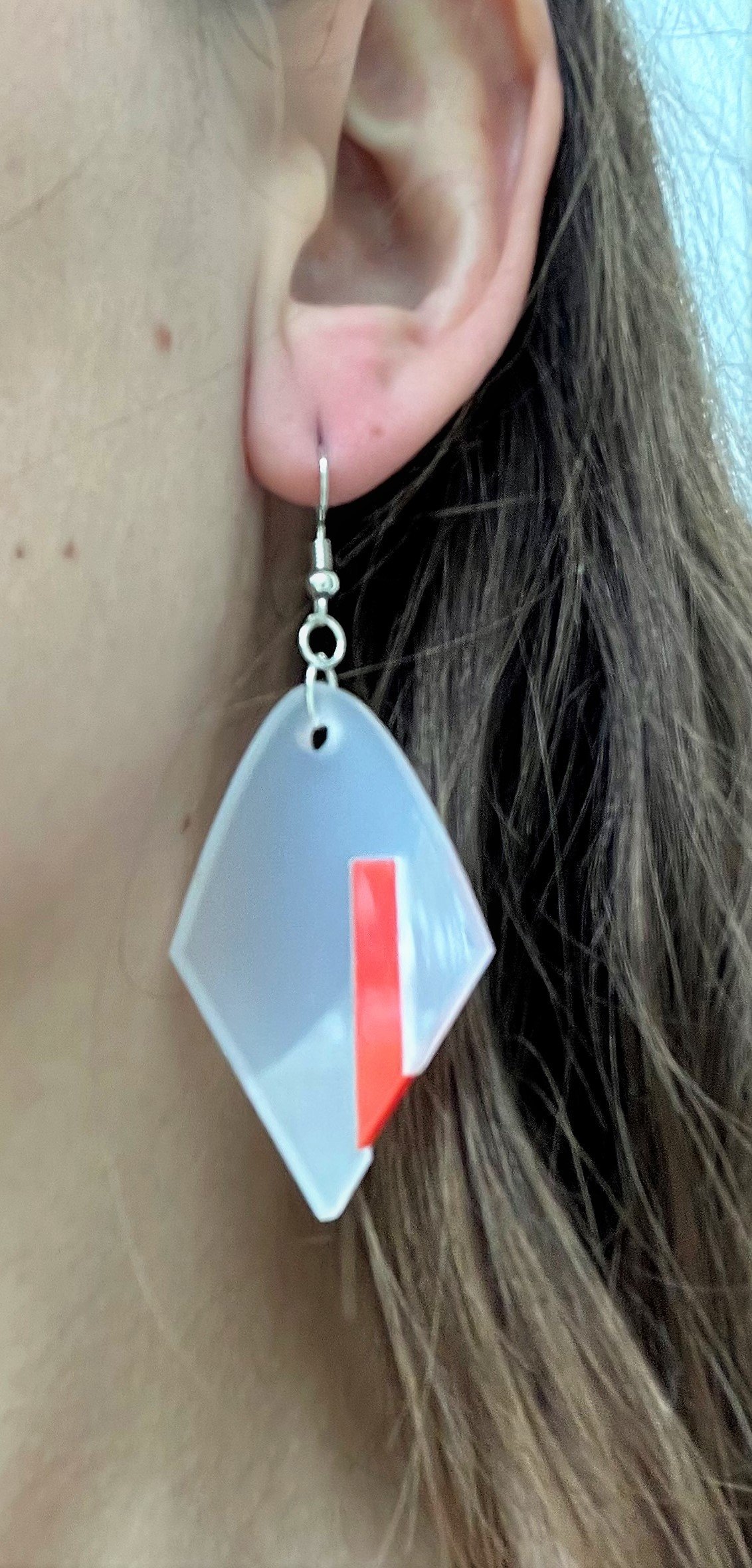 cover image of th tinker drop earring with cut-out