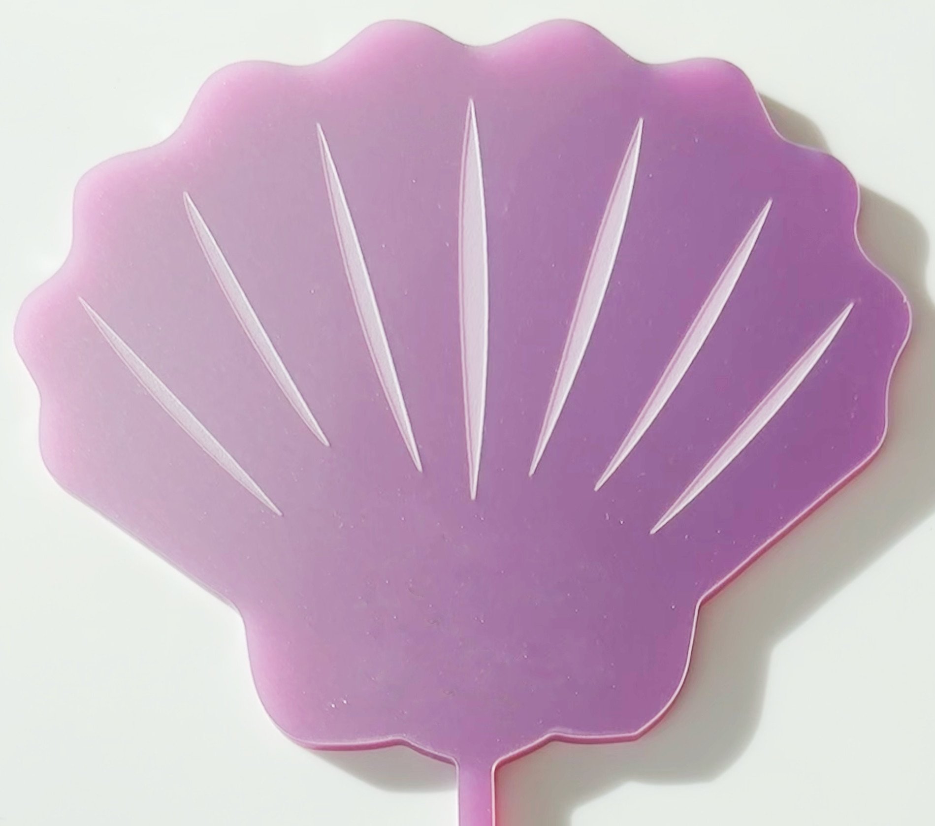 cover image of th tinker Sea shell cake topper
